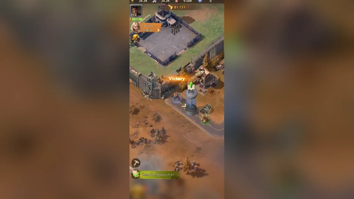 Base in Z Route: Redemption with a Victory banner after a block is cleared, walls and the first buildings